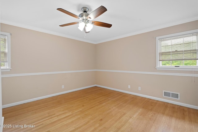 9111 Royal Oak Dr, Louisville, KY 40272 - unfurnished room with light wood-type flooring, baseboards, ceiling fan, and crown molding