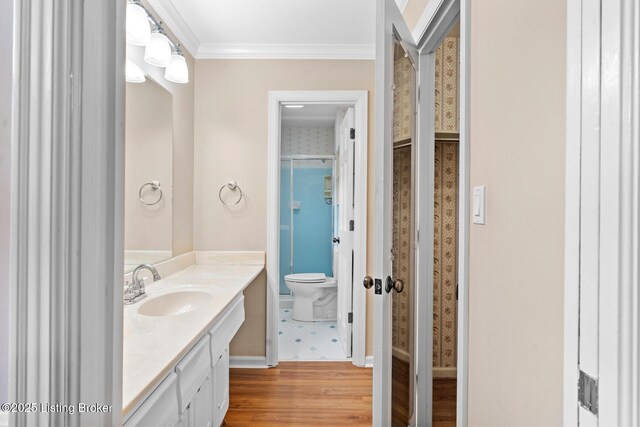 9111 Royal Oak Dr, Louisville, KY 40272 - full bath with toilet, vanity, crown molding, wood finished floors, and baseboards