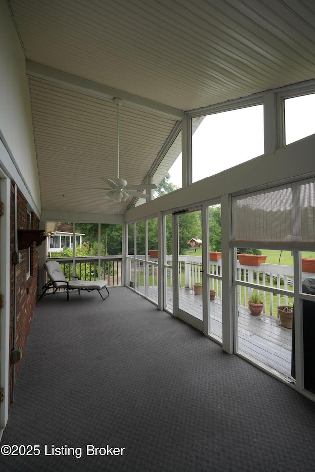 9111 Royal Oak Dr, Louisville, KY 40272 - unfurnished sunroom with plenty of natural light, ceiling fan, and lofted ceiling