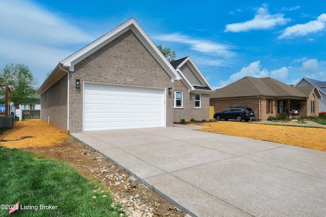 view of property exterior featuring a yard, brick siding, a garage, central AC, and concrete driveway
