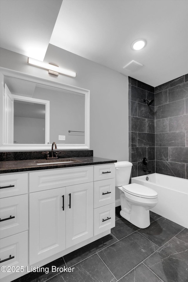 full bathroom with vanity, toilet, and bathtub / shower combination