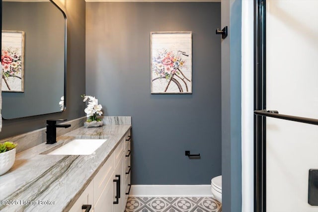 7492 Edith Way, Crestwood, KY 40014 - bathroom with baseboards, toilet, and vanity