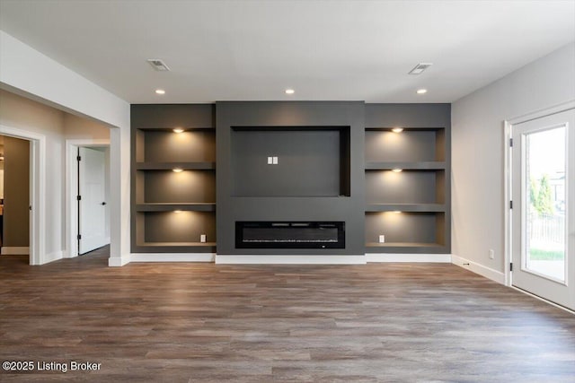 7492 Edith Way, Crestwood, KY 40014 - unfurnished living room featuring baseboards, visible vents, built in shelves, and wood finished floors