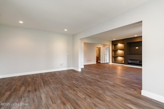 7492 Edith Way, Crestwood, KY 40014 - unfurnished room featuring baseboards, built in shelves, and wood finished floors