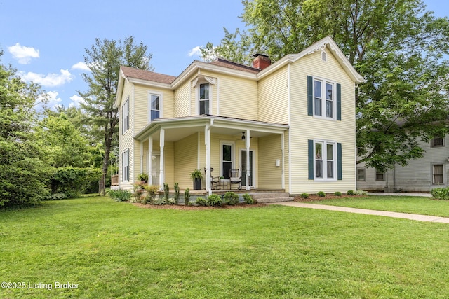309 W Madison St, La Grange, KY 40031 - view of front of home featuring a chimney, covered porch, and a front lawn