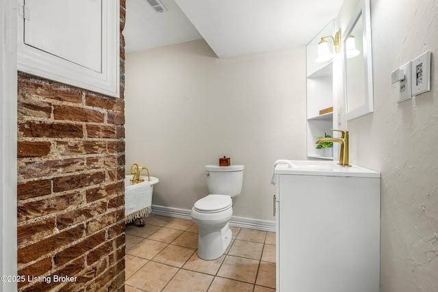 309 W Madison St, La Grange, KY 40031 - half bathroom featuring tile patterned flooring, toilet, vanity, and baseboards