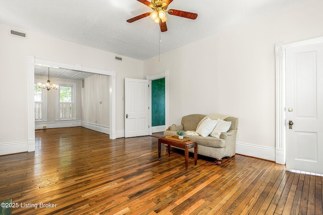 309 W Madison St, La Grange, KY 40031 - living area with wood-type flooring, a chandelier, a ceiling fan, and baseboards
