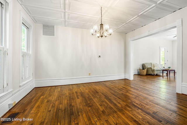 309 W Madison St, La Grange, KY 40031 - unfurnished dining area with a chandelier, healthy amount of natural light, dark wood finished floors, and baseboards