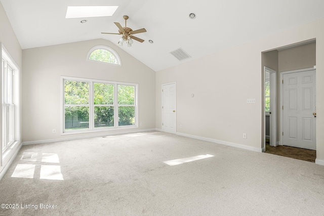 309 W Madison St, La Grange, KY 40031 - empty room with a skylight, carpet, a ceiling fan, high vaulted ceiling, and baseboards