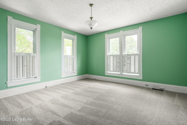 309 W Madison St, La Grange, KY 40031 - carpeted empty room featuring a textured ceiling and baseboards