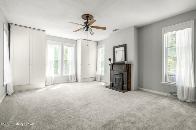 309 W Madison St, La Grange, KY 40031 - unfurnished living room with ceiling fan, a fireplace with flush hearth, carpet flooring, and baseboards