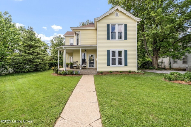 309 W Madison St, La Grange, KY 40031 - view of front of home with a porch, a front lawn, and central air condition unit