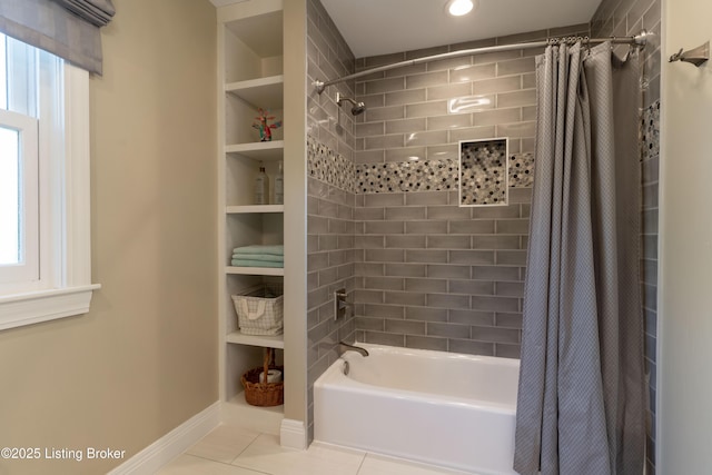 bathroom with baseboards, shower / tub combo with curtain, and tile patterned flooring