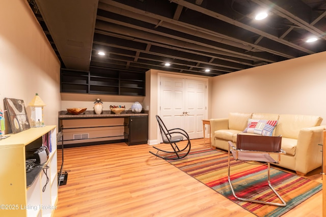living area featuring wood finished floors