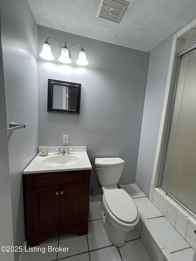 4213 Shenandoah Dr, Louisville, KY 40241 - bathroom with a textured ceiling, visible vents, toilet, and a shower with door