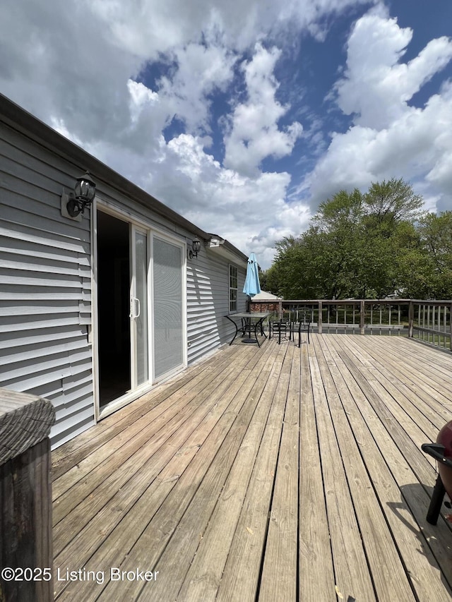 4213 Shenandoah Dr, Louisville, KY 40241 - wooden deck featuring outdoor dining area