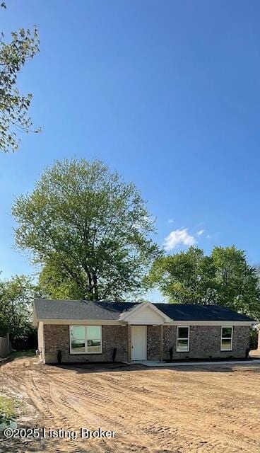 ranch-style house with brick siding