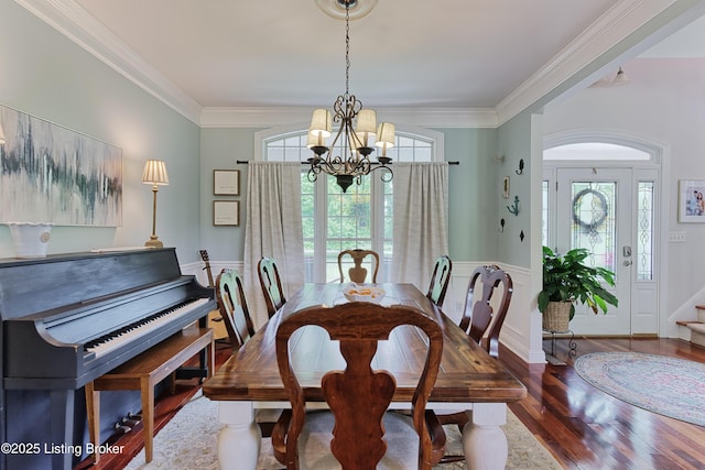 3817 Carriage Hill Dr, Crestwood, KY 40014 - dining area featuring a chandelier, wood finished floors, ornamental molding, and wainscoting