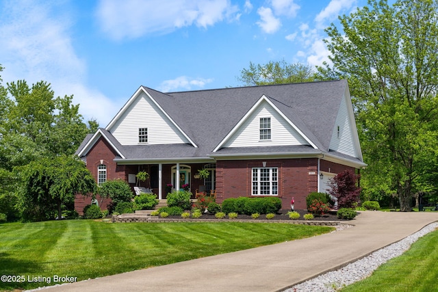 3817 Carriage Hill Dr, Crestwood, KY 40014 - traditional home with brick siding, covered porch, a front yard, asphalt driveway, and a shingled roof