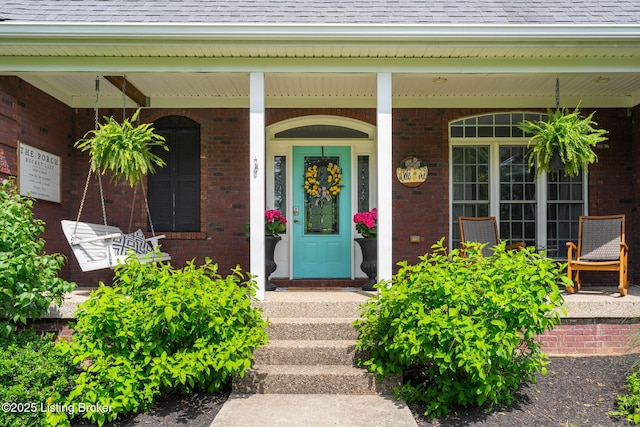 3817 Carriage Hill Dr, Crestwood, KY 40014 - entrance to property with brick siding, roof with shingles, and covered porch