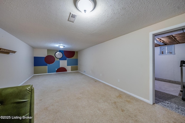 109 Terri Rose Ct, Hodgenville, KY 42748 - finished basement featuring a textured ceiling, visible vents, carpet floors, and baseboards