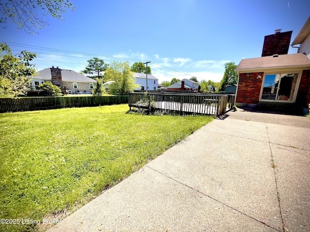 view of yard featuring a patio and a fenced backyard