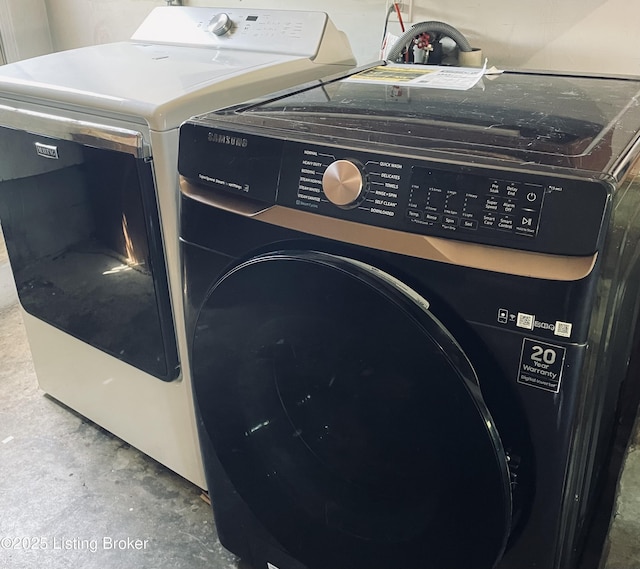 washroom with washer and dryer and laundry area