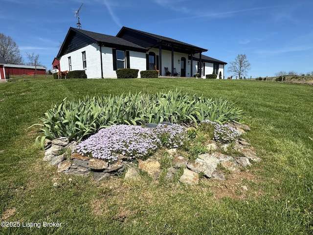 exterior space with a front lawn