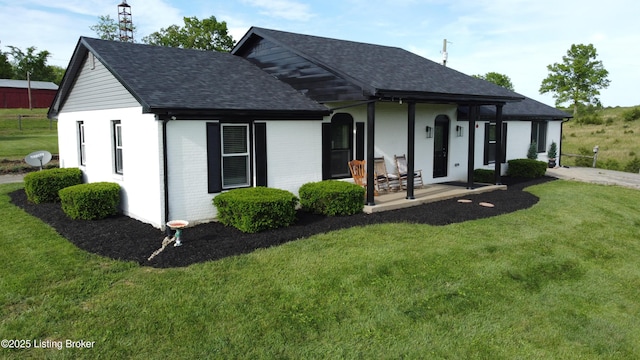 4200 Raywick Rd, Raywick, KY 40060 - view of front of home with roof with shingles, a front yard, brick siding, and a porch