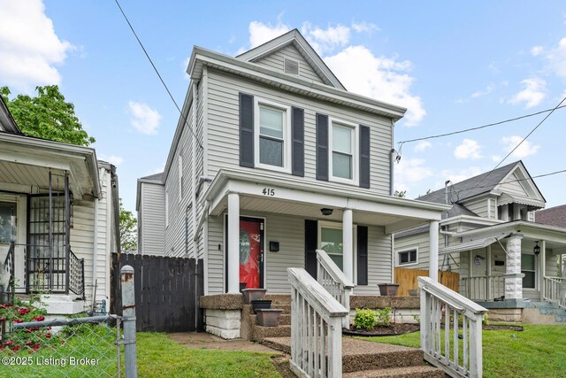 415 Gwendolyn St, Louisville, KY 40203 - view of front facade with a porch and a gate