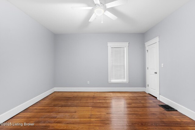 415 Gwendolyn St, Louisville, KY 40203 - spare room featuring hardwood / wood-style floors, baseboards, and ceiling fan