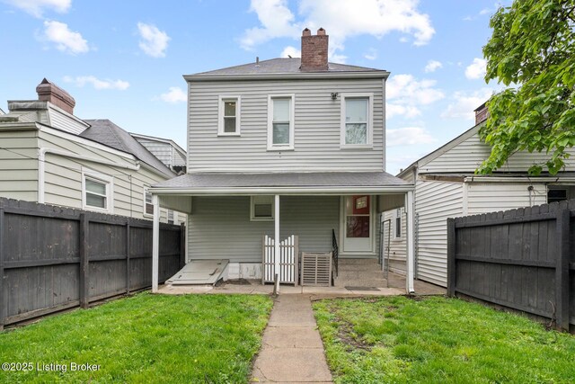 415 Gwendolyn St, Louisville, KY 40203 - rear view of property with a chimney