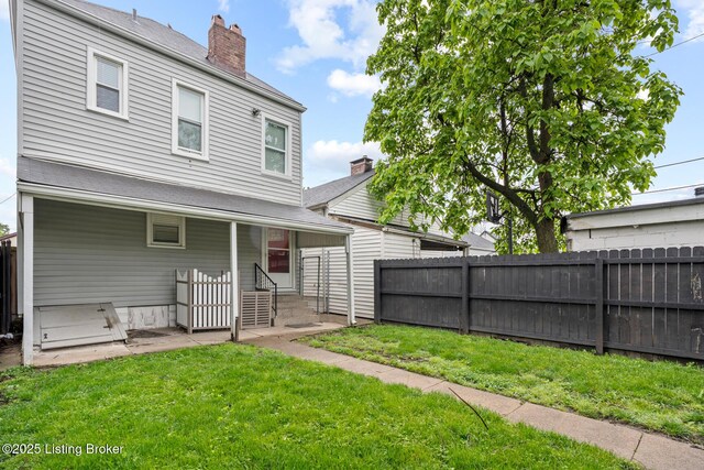 415 Gwendolyn St, Louisville, KY 40203 - back of property with a chimney