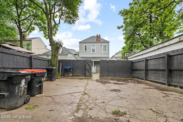 415 Gwendolyn St, Louisville, KY 40203 - fenced backyard with a patio