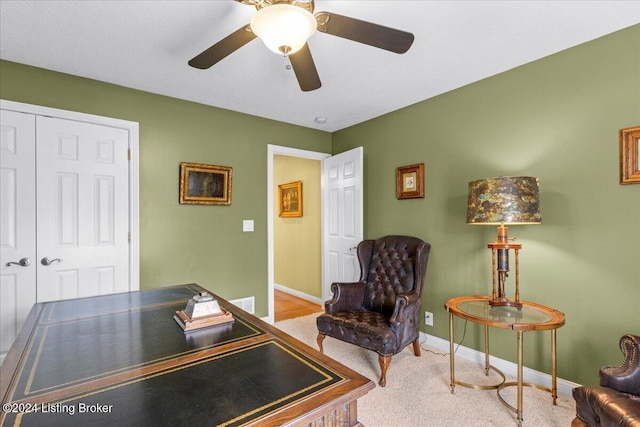 home office with visible vents, a ceiling fan, and baseboards