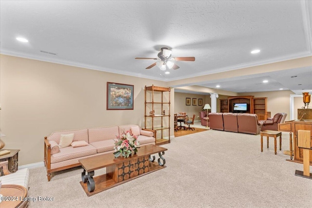 carpeted living room with ornamental molding, recessed lighting, a ceiling fan, and baseboards
