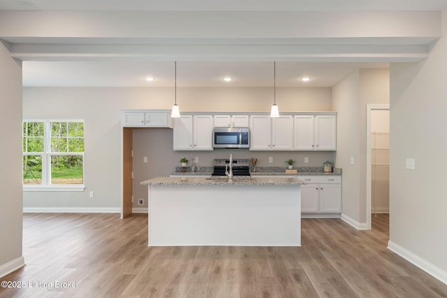 1332 Etawah Ave, Louisville, KY 40222 - kitchen featuring stainless steel microwave, electric range, baseboards, white cabinets, and recessed lighting