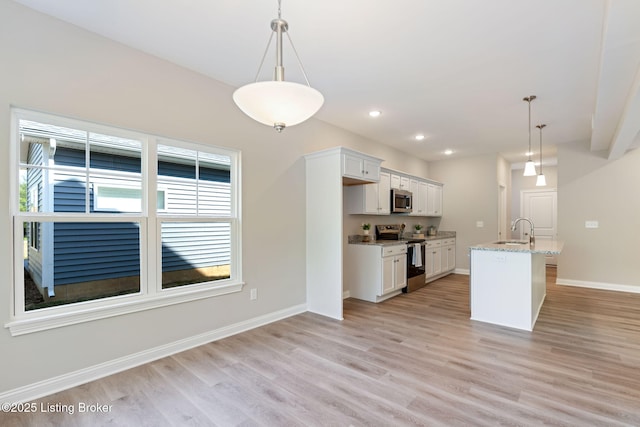 1332 Etawah Ave, Louisville, KY 40222 - kitchen with stainless steel appliances, a sink, light wood-type flooring, white cabinetry, and baseboards