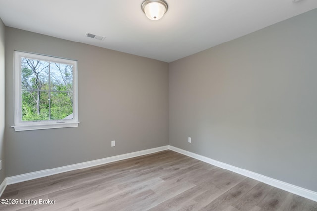 1332 Etawah Ave, Louisville, KY 40222 - empty room featuring light wood finished floors and baseboards