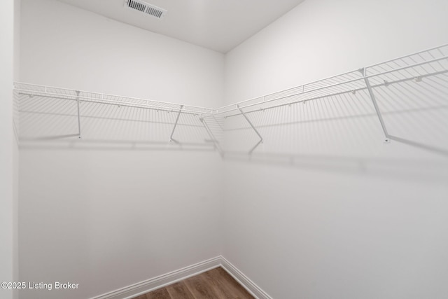 1332 Etawah Ave, Louisville, KY 40222 - spacious closet featuring dark wood-style floors