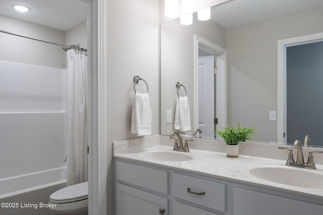 1332 Etawah Ave, Louisville, KY 40222 - bathroom with double vanity, toilet, and shower / bath combo with shower curtain