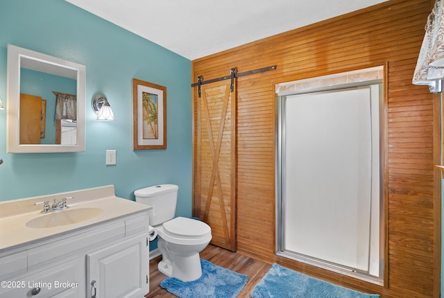 117 Fairview Dr, Waddy, KY 40076 - full bathroom with vanity, curtained shower, wooden walls, toilet, and wood finished floors