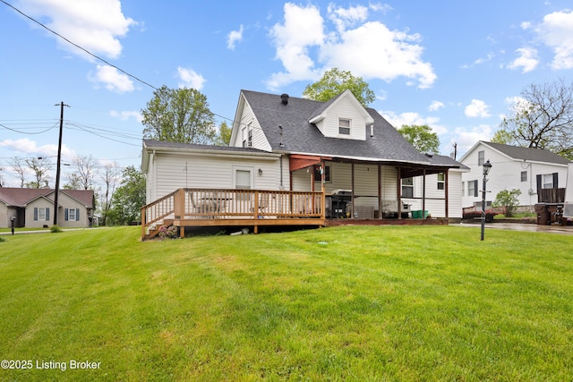 117 Fairview Dr, Waddy, KY 40076 - rear view of house with a deck, a yard, and a shingled roof