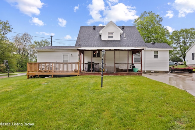 117 Fairview Dr, Waddy, KY 40076 - back of house with a wooden deck, a shingled roof, and a yard