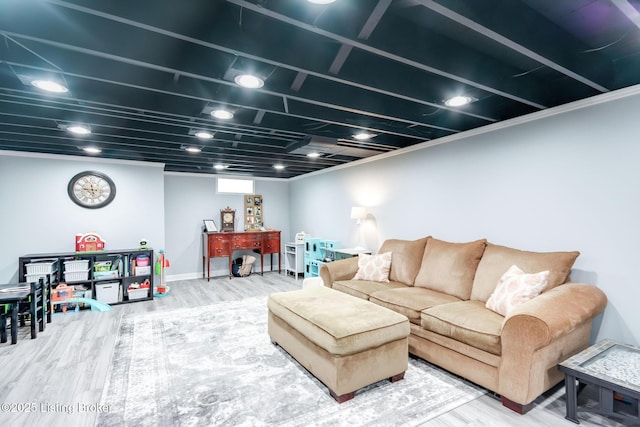 living room with wood finished floors and baseboards