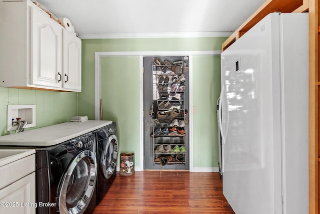 1465 N Buckman St, Shepherdsville, KY 40165 - laundry room with ornamental molding, cabinet space, washing machine and clothes dryer, and dark wood-type flooring