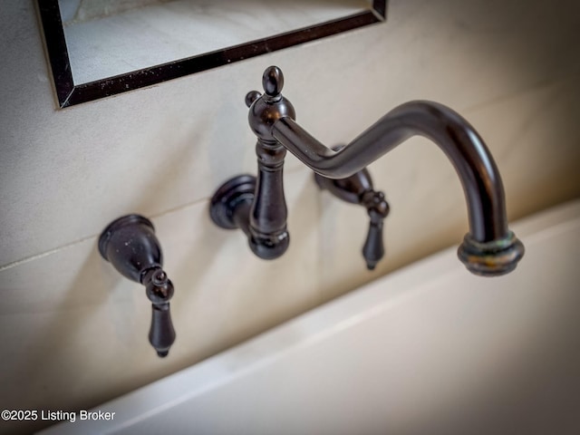 interior details featuring a sink