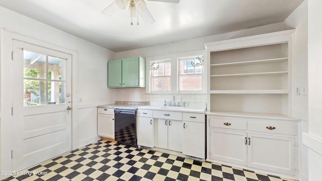 kitchen with open shelves, light floors, dishwasher, and a healthy amount of sunlight