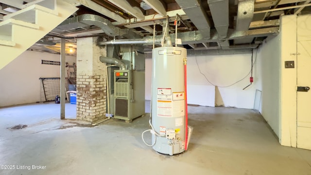 unfinished below grade area featuring water heater and heating unit