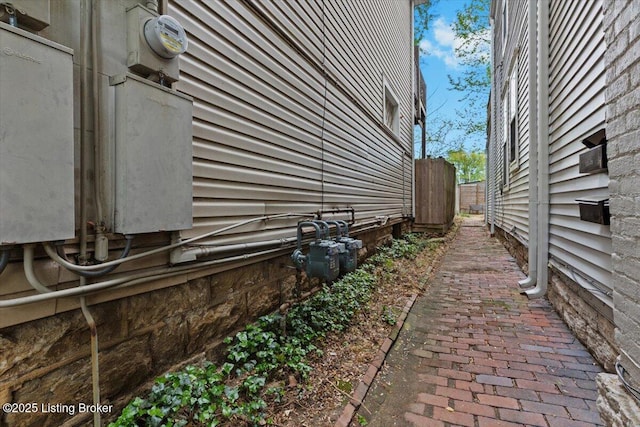 view of property exterior featuring fence